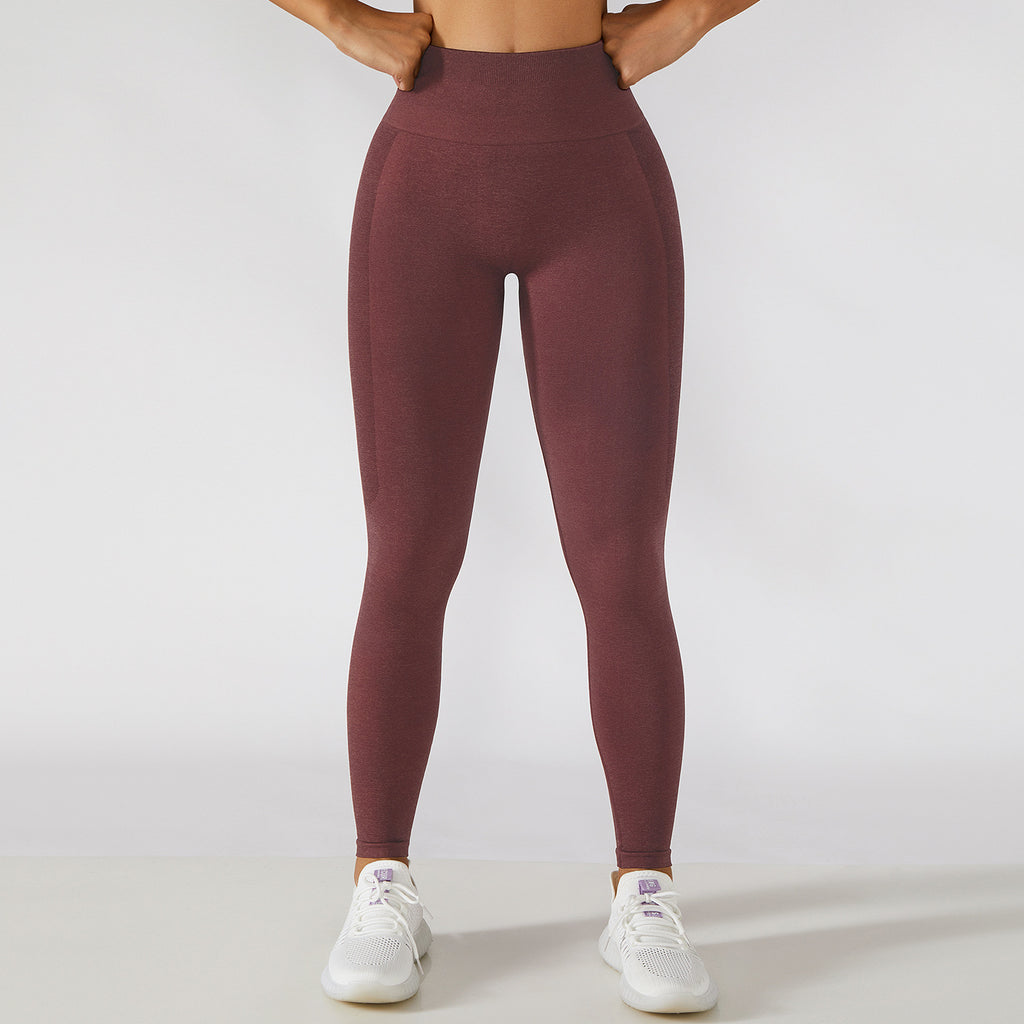 Calça legging esportiva de cintura alta para treino e corrida, com efeito levanta-quadril e modelagem que valoriza a musculatura.