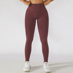Calça legging esportiva de cintura alta para treino e corrida, com efeito levanta-quadril e modelagem que valoriza a musculatura.