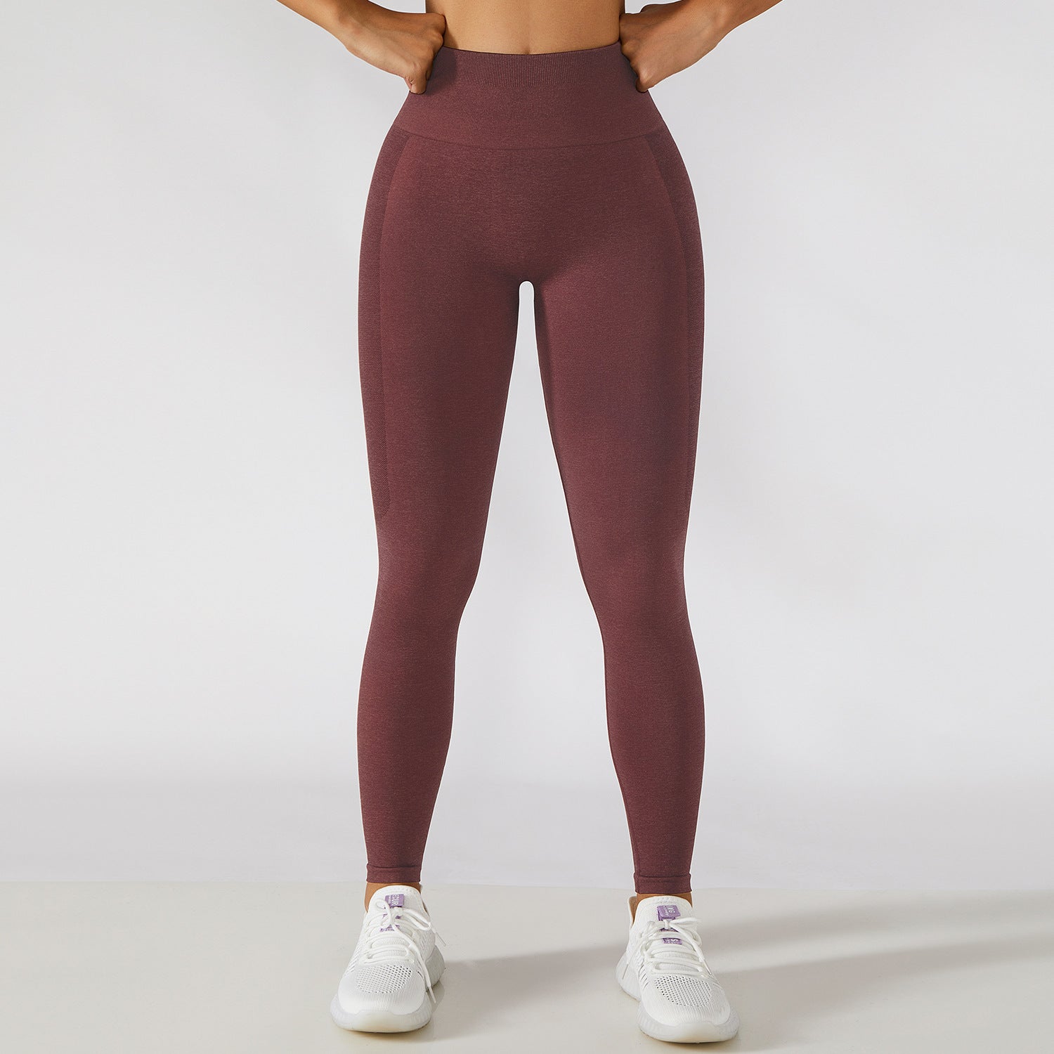 Calça legging esportiva de cintura alta para treino e corrida, com efeito levanta-quadril e modelagem que valoriza a musculatura.