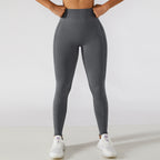 Calça legging esportiva de cintura alta para treino e corrida, com efeito levanta-quadril e modelagem que valoriza a musculatura.