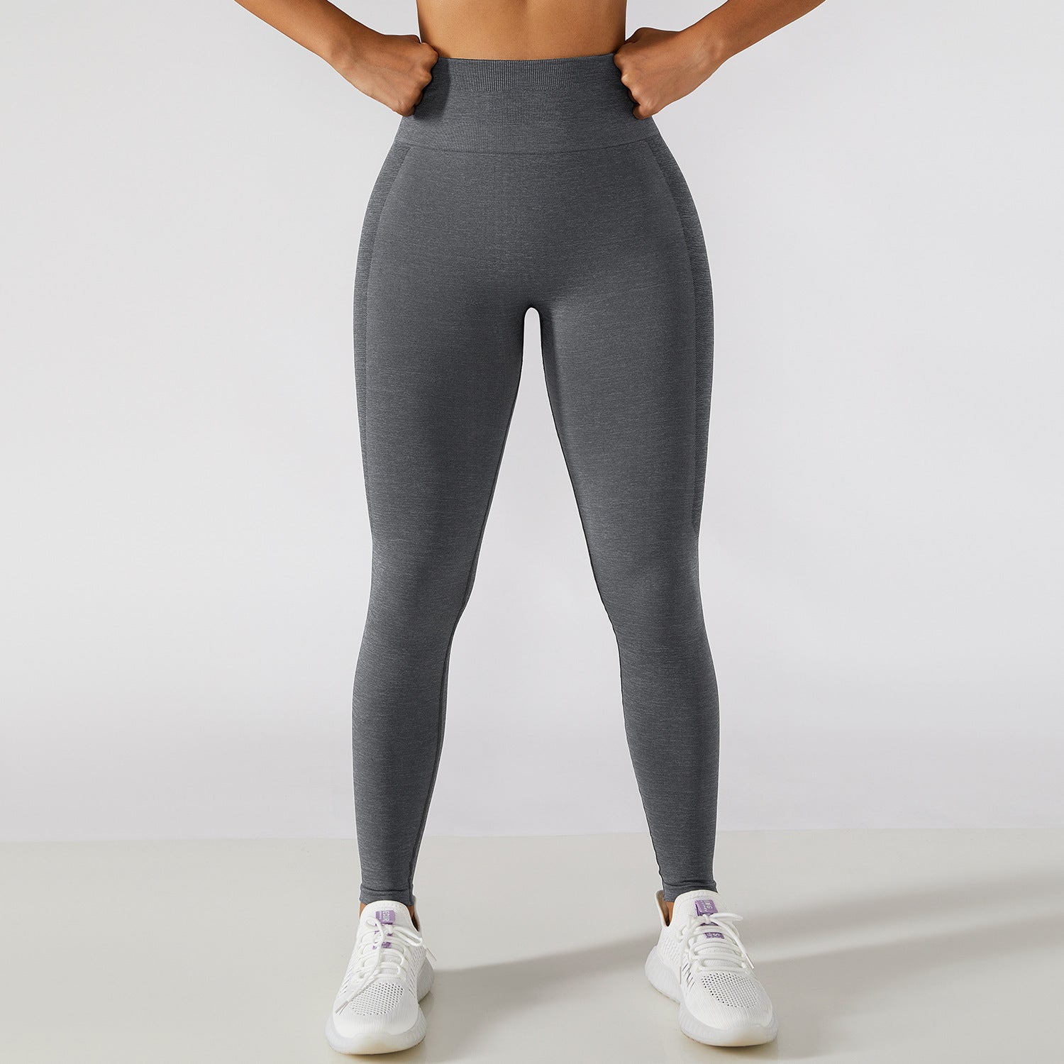 Calça legging esportiva de cintura alta para treino e corrida, com efeito levanta-quadril e modelagem que valoriza a musculatura.