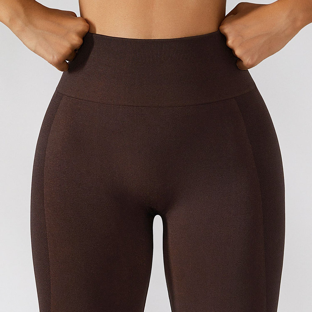 Calça legging esportiva de cintura alta para treino e corrida, com efeito levanta-quadril e modelagem que valoriza a musculatura.