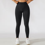 Calça legging esportiva de cintura alta para treino e corrida, com efeito levanta-quadril e modelagem que valoriza a musculatura.