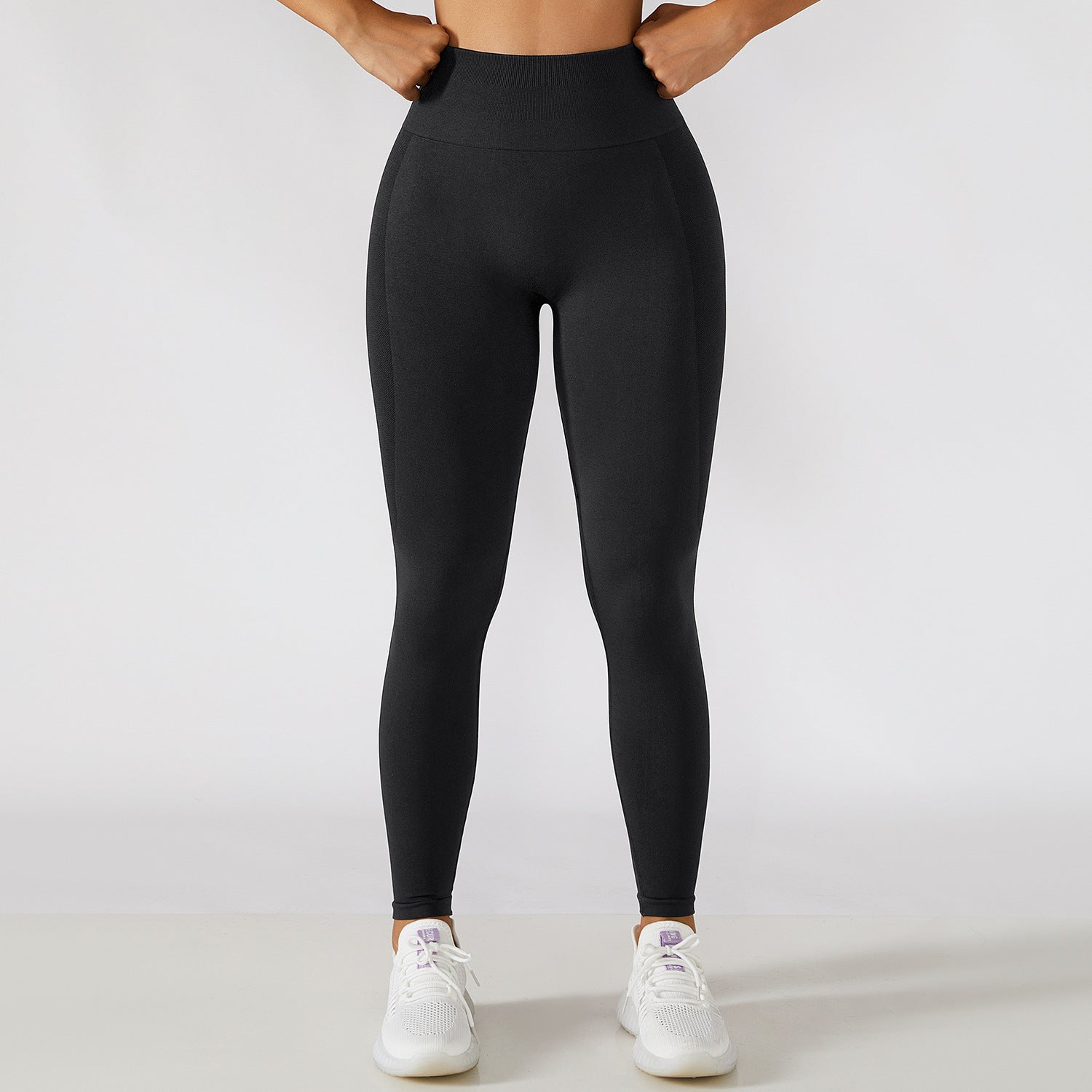 Calça legging esportiva de cintura alta para treino e corrida, com efeito levanta-quadril e modelagem que valoriza a musculatura.