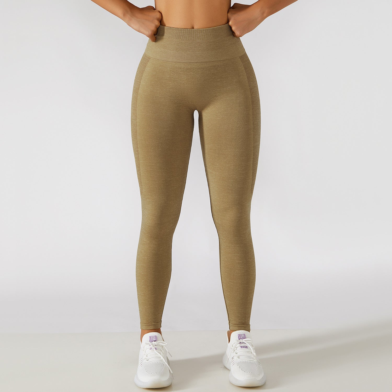 Calça legging esportiva de cintura alta para treino e corrida, com efeito levanta-quadril e modelagem que valoriza a musculatura.