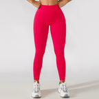 Calça legging esportiva de cintura alta para treino e corrida, com efeito levanta-quadril e modelagem que valoriza a musculatura.