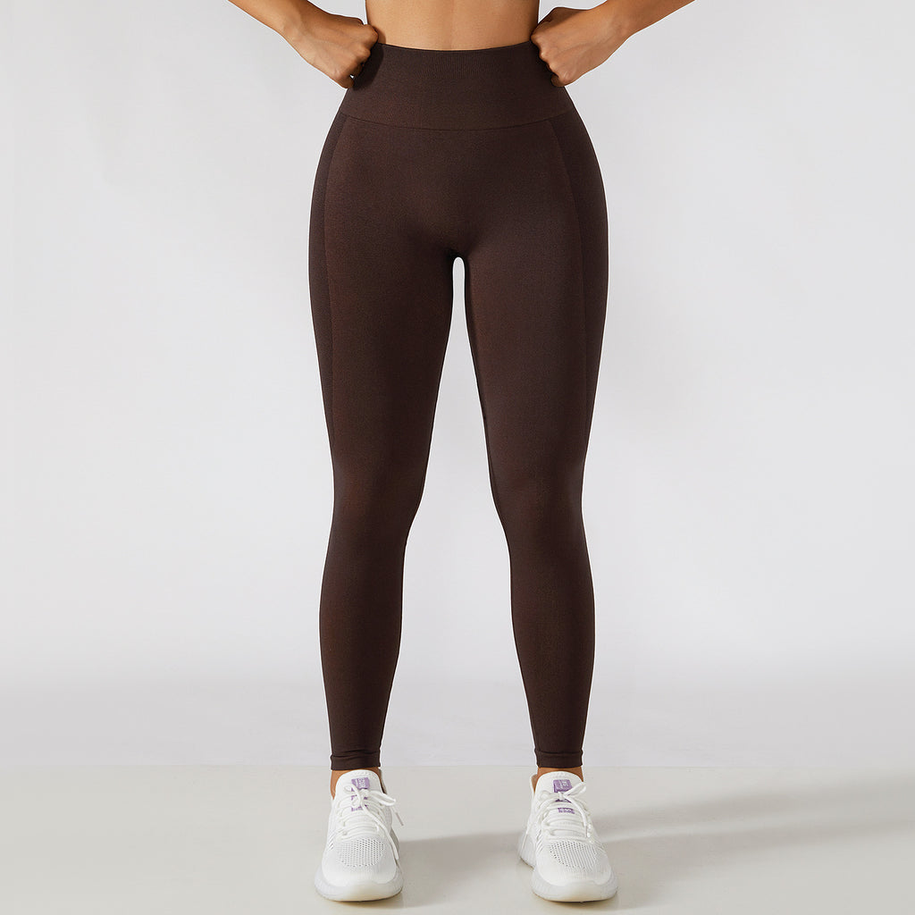 Calça legging esportiva de cintura alta para treino e corrida, com efeito levanta-quadril e modelagem que valoriza a musculatura.