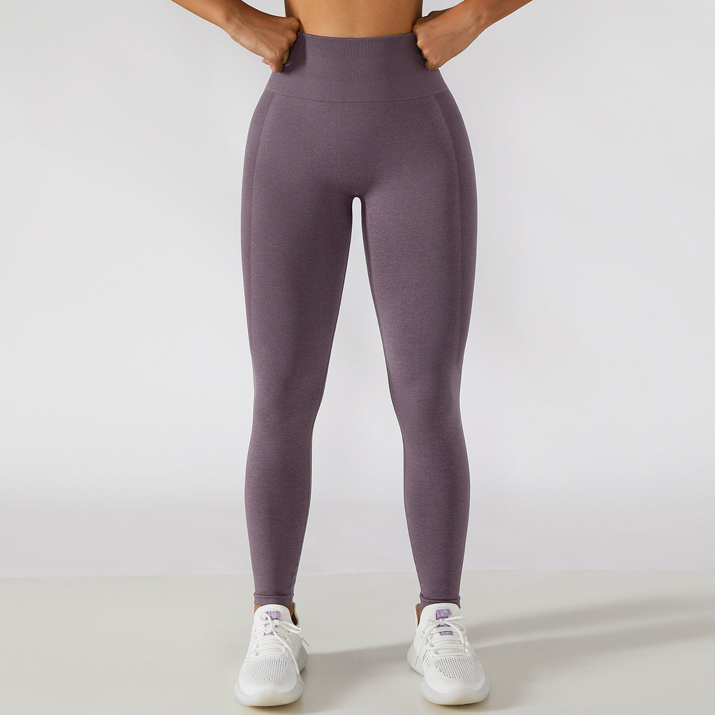 Calça legging esportiva de cintura alta para treino e corrida, com efeito levanta-quadril e modelagem que valoriza a musculatura.